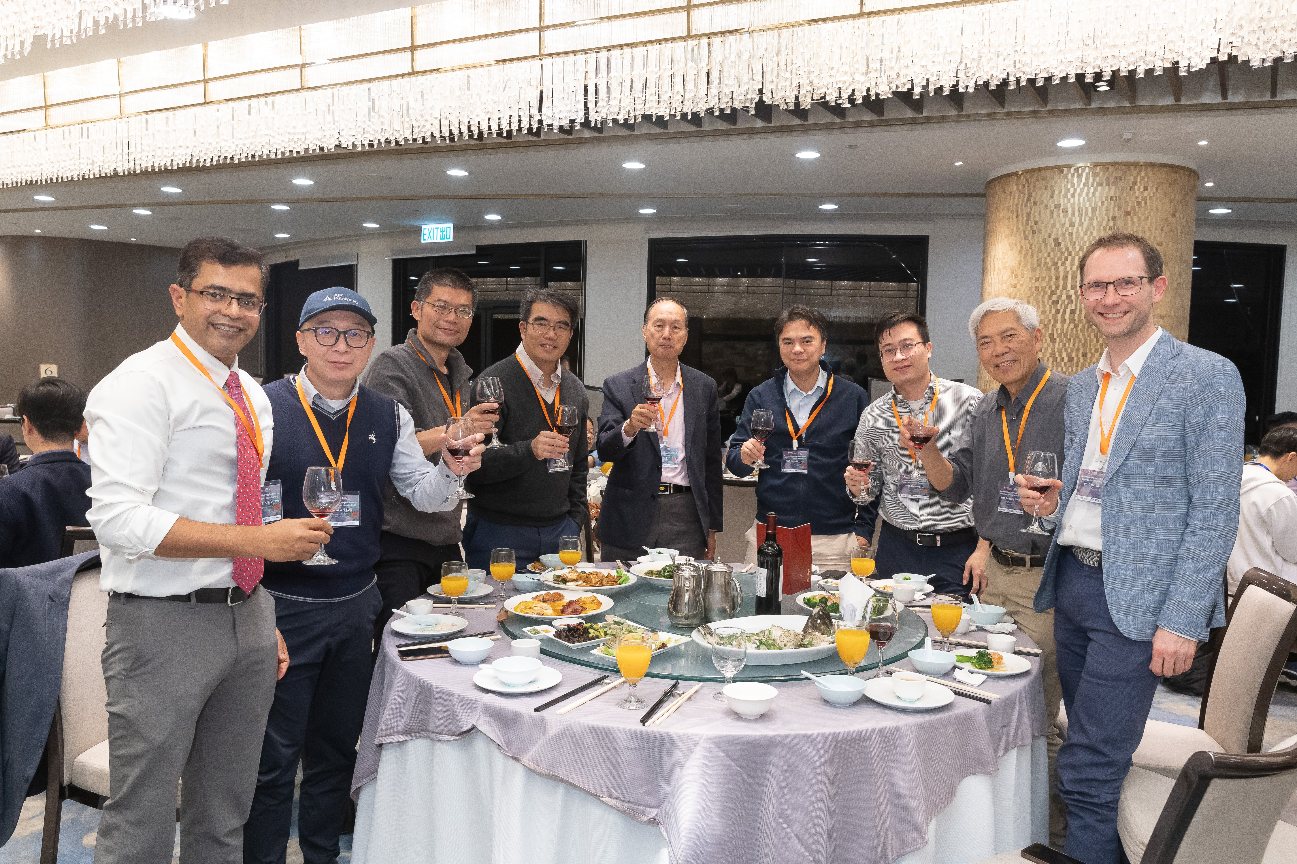 Conference Dinner delegates raising glasses at China Garden Restaurant