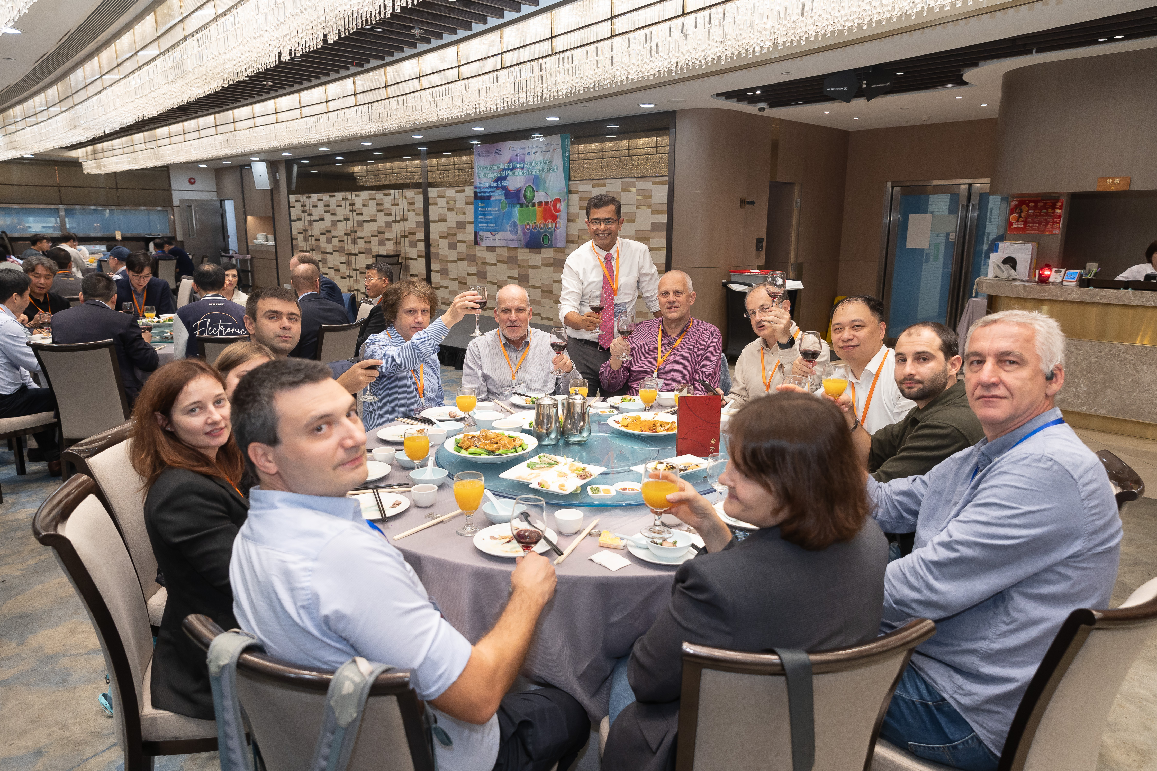 Conference Dinner group photo around a banquet table